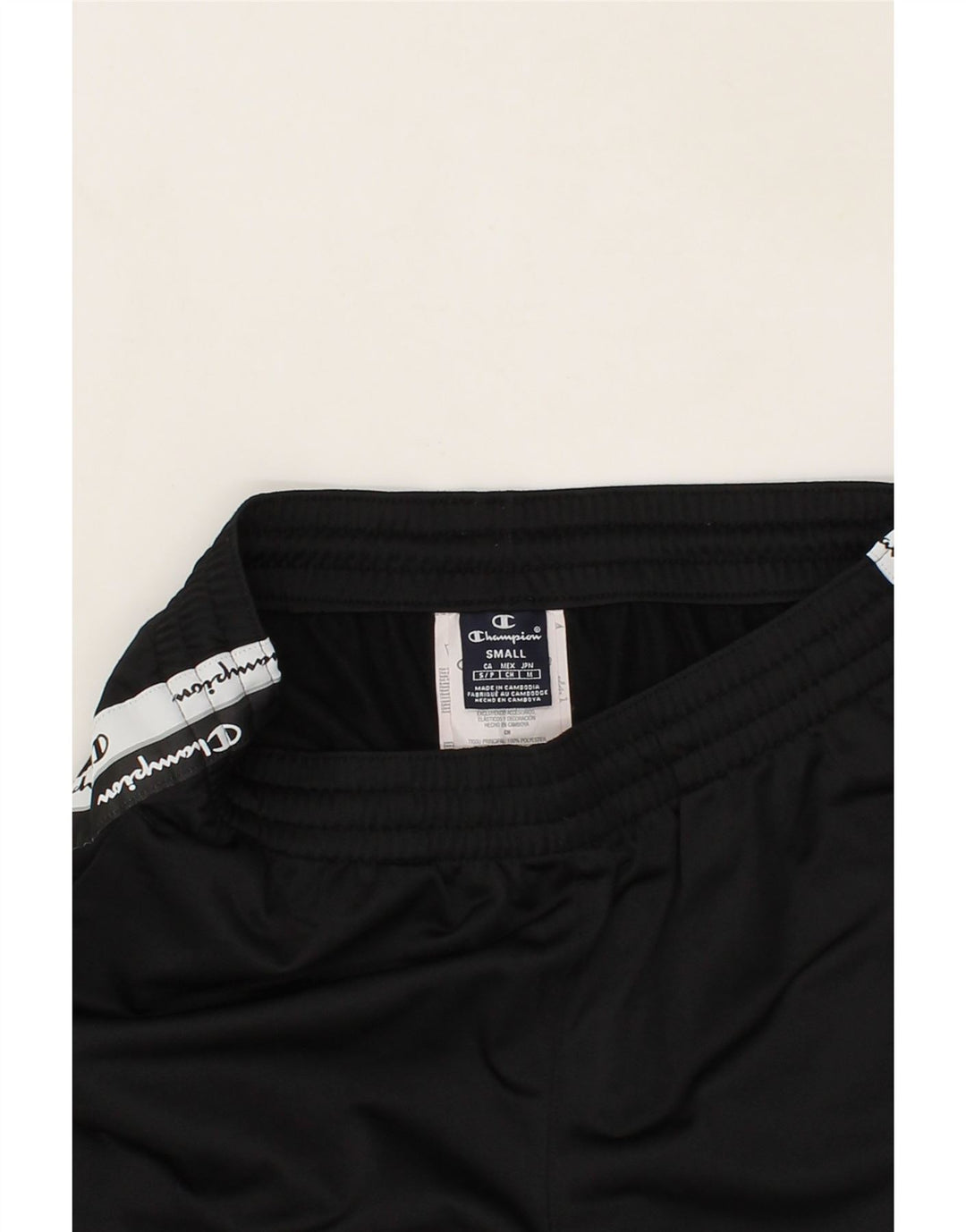 CHAMPION Mens Graphic Tracksuit Trousers Small Black Polyester Vintage Champion and Second-Hand Champion from Messina Hembry 