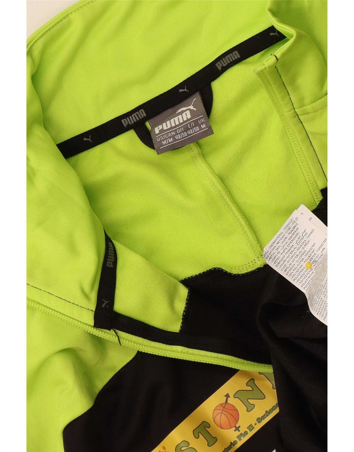 Puma Herren-Trainingsanzugoberteil mit Grafik, Mittelschwarz, Farbblock-Polyester