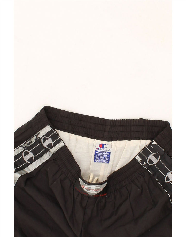 CHAMPION Mens Graphic Tracksuit Trousers XS Black Polyester Vintage Champion and Second-Hand Champion from Messina Hembry 