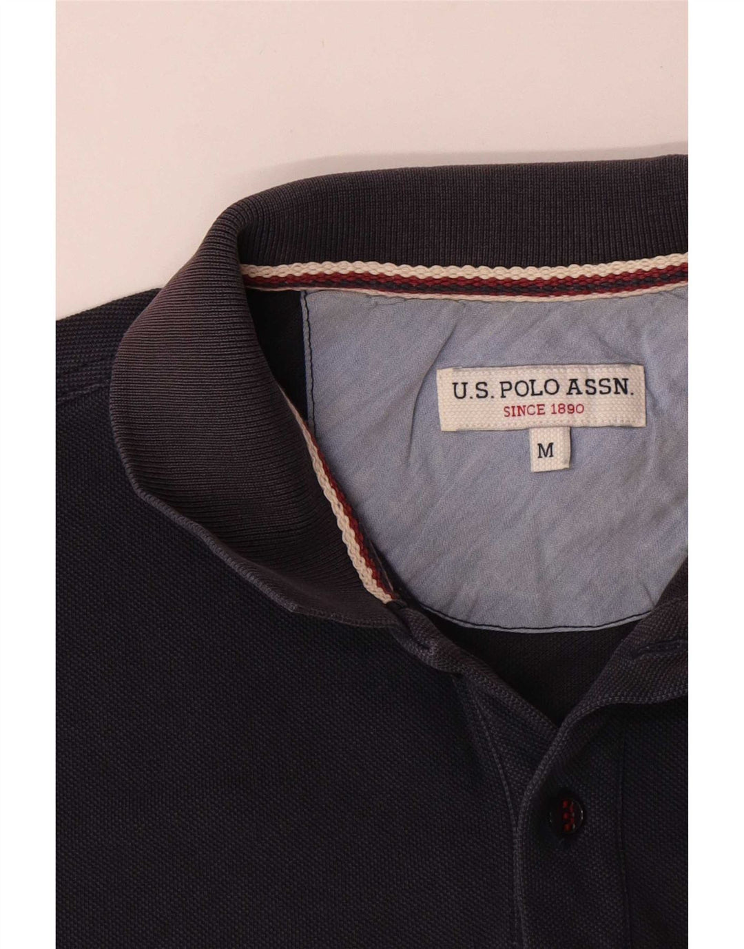 U.S. Polo Assn. Herren-Poloshirt aus mittelblauer Baumwolle in Marineblau