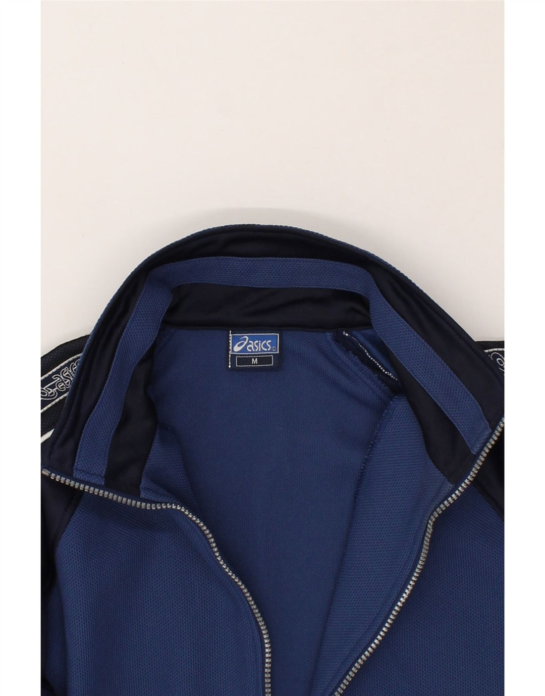 ASICS Herren-Trainingsanzug mit grafischem Oberteil, mittleres Marineblau, Farbblock