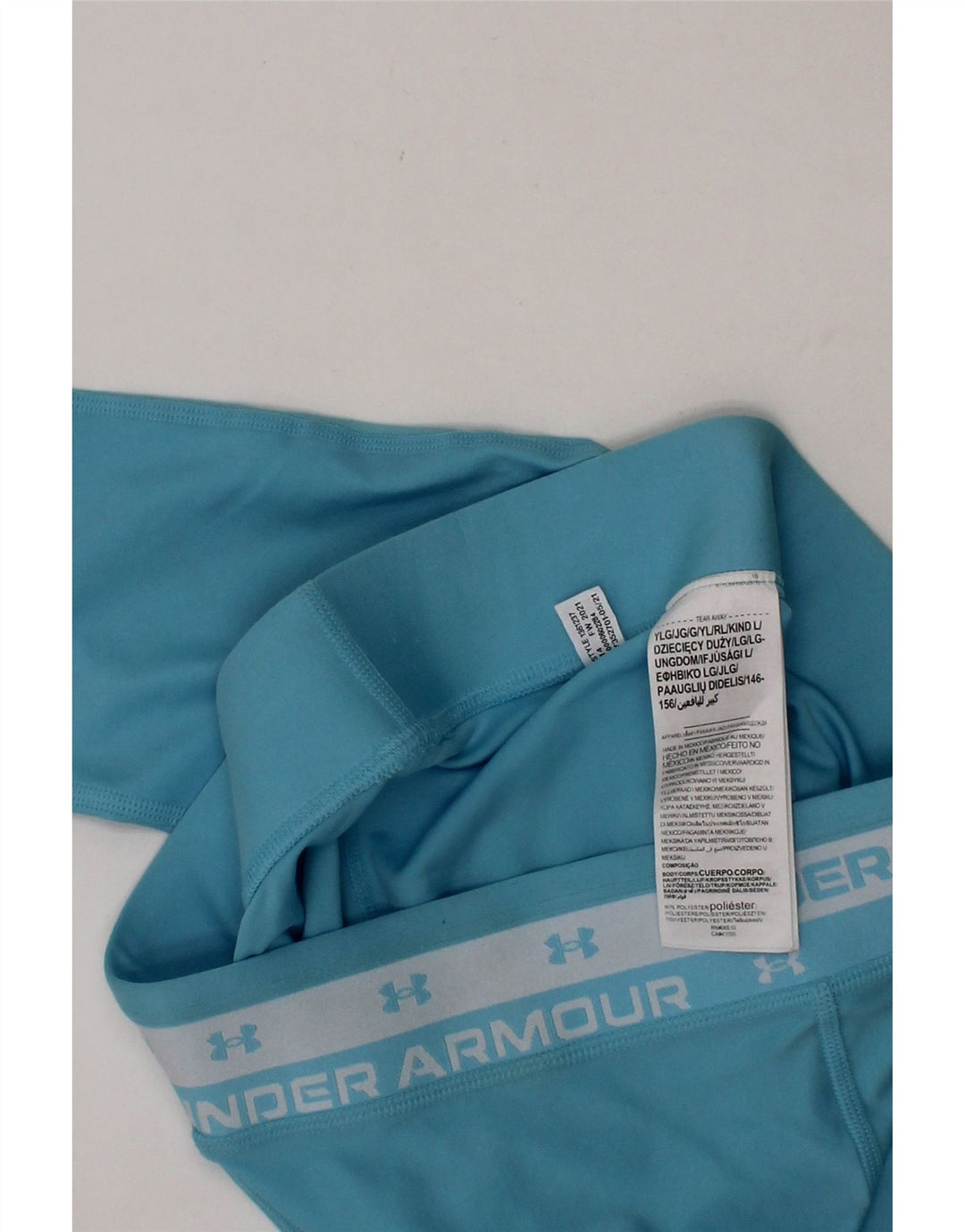 UNDER ARMOUR Girls Graphic Leggings 11-12 Years Large Blue Polyester Vintage Under Armour and Second-Hand Under Armour from Messina Hembry 