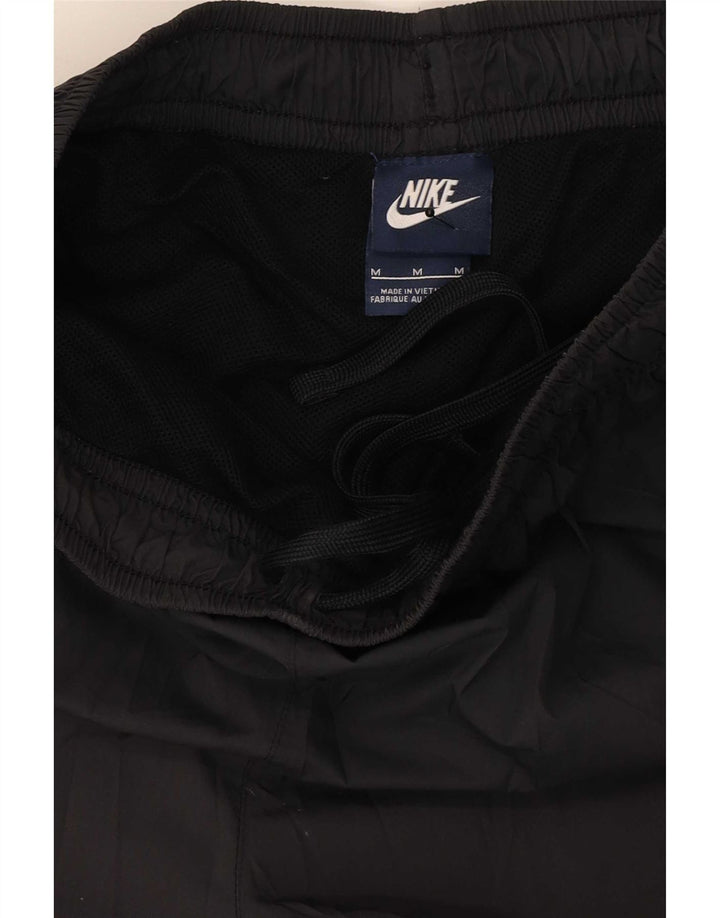 Nike Herren-Trainingshose aus mittelgrauem Polyester