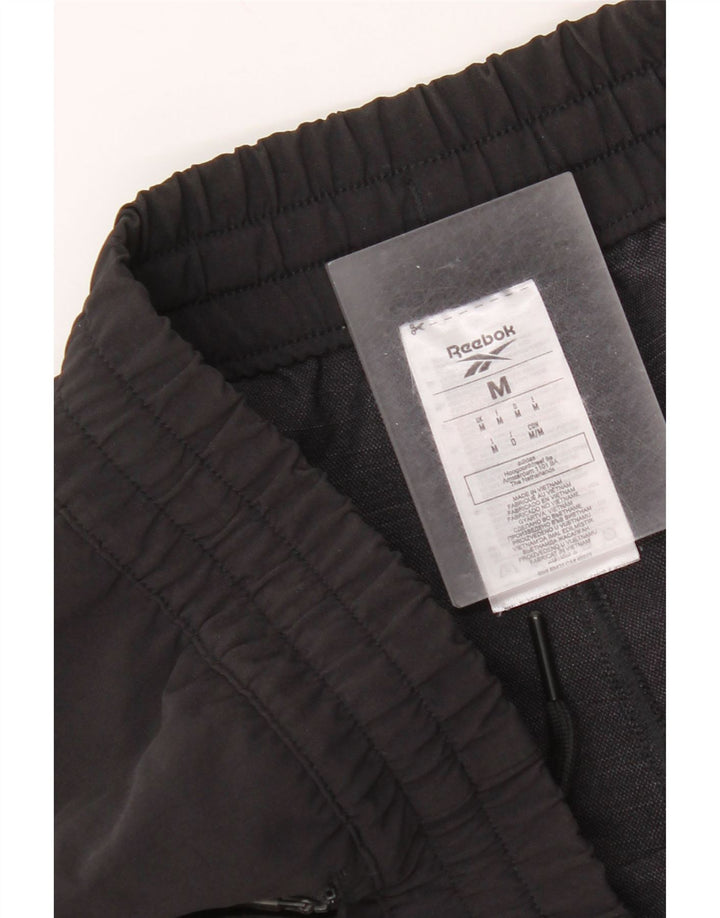 Reebok Herren-Trainingshose, mittelschwarz, Polyamid