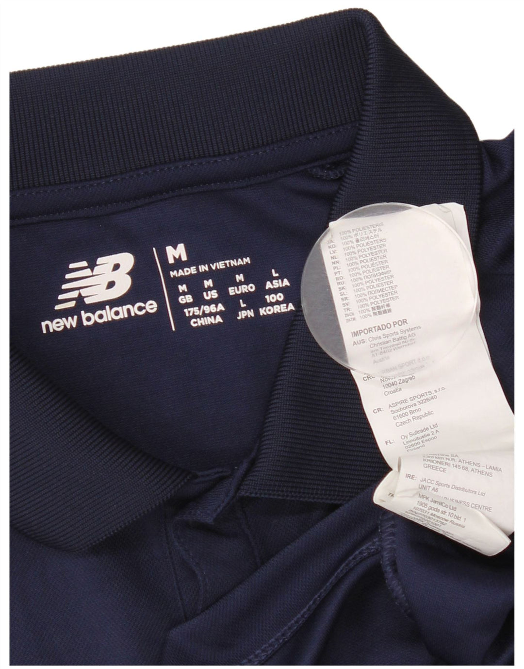 New Balance Herren-Poloshirt mit Grafik, mittleres Marineblau, Polyester