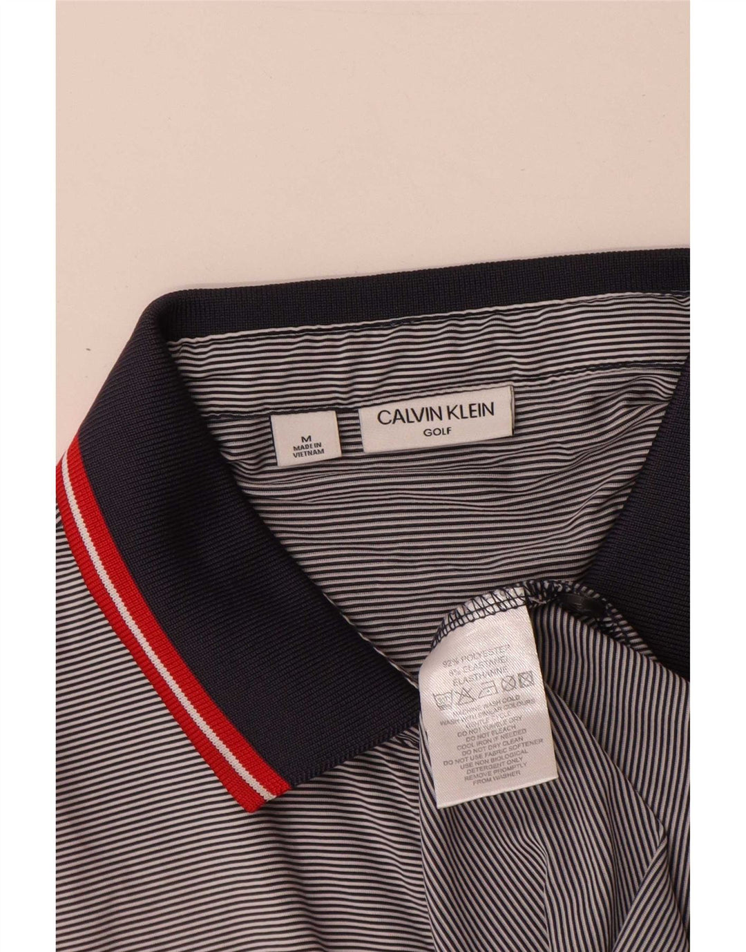 Calvin Klein Herren-Poloshirt aus mittelgrauem Nadelstreifen-Polyester