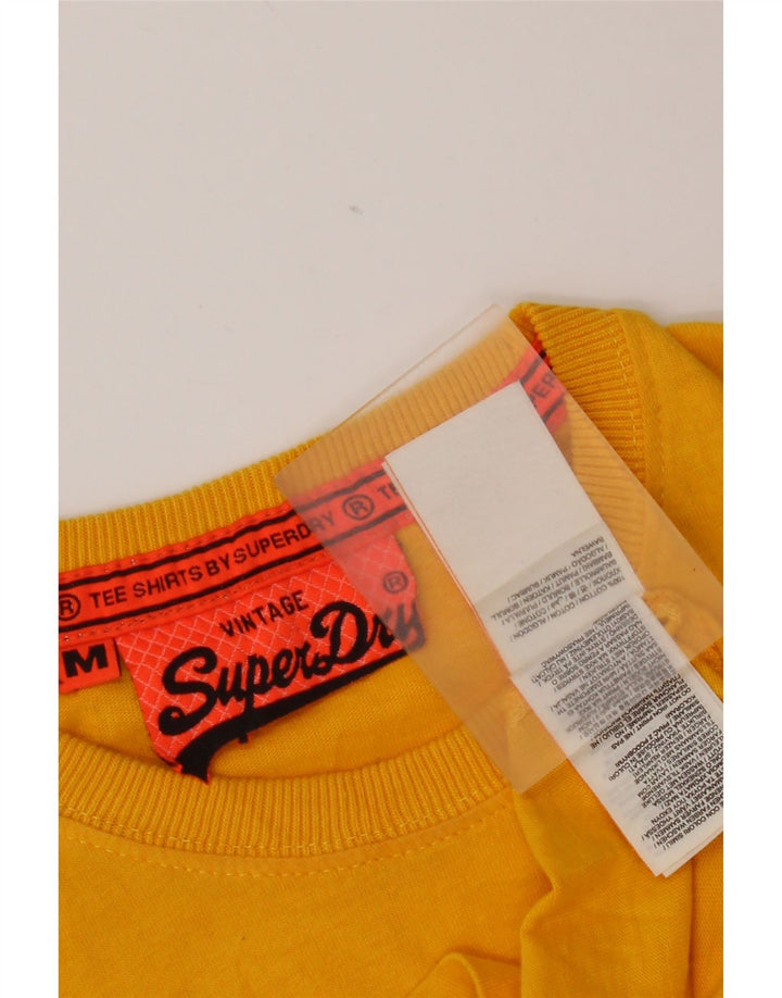Superdry Herren Grafik-T-Shirt-Oberteil aus mittelgelber Baumwolle
