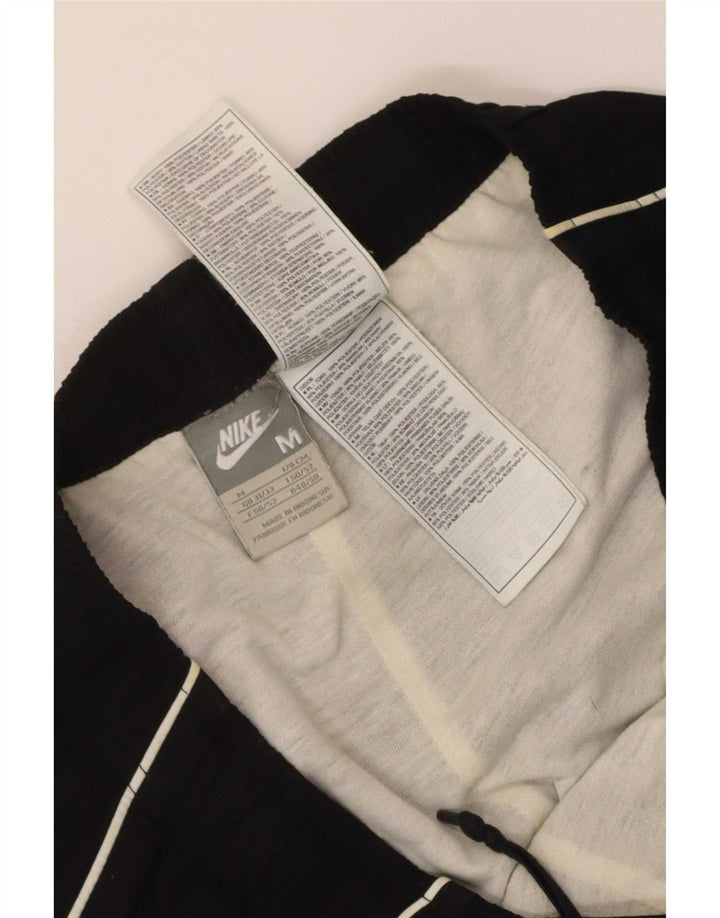 Nike Herren-Trainingshose mit Grafik, mittelgroß, schwarz, Polyester