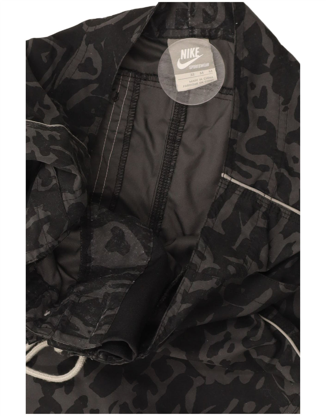 NIKE Herren-Badeshorts mit abstraktem Muster, mittelschwarz