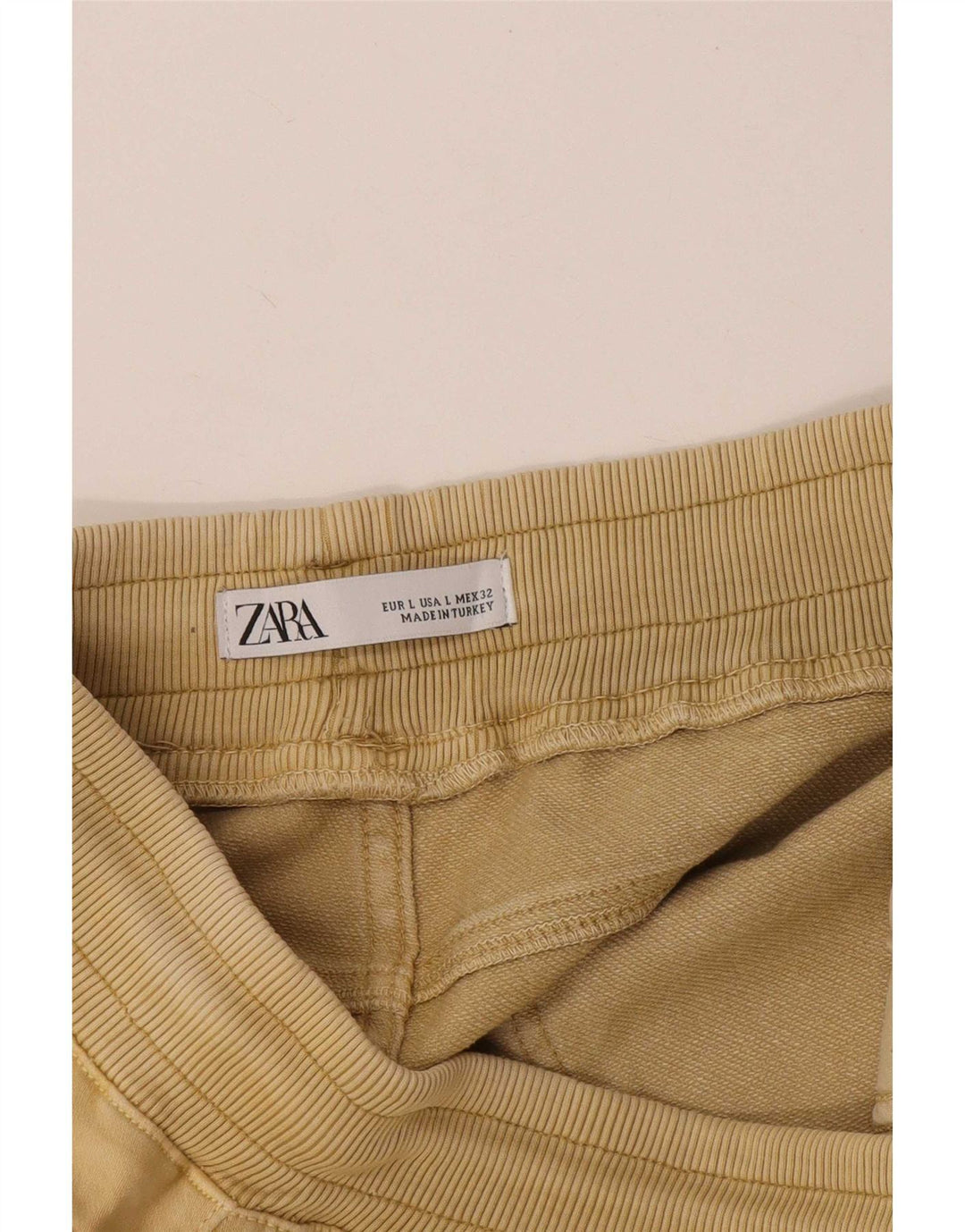 Schmale, verkürzte Herrenhose von Zara, Größe L, W32, L25, Gelb