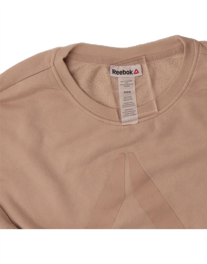 REEBOK Womens Oversized Graphic Sweatshirt Jumper UK 14 Medium Beige Vintage Reebok and Second-Hand Reebok from Messina Hembry 