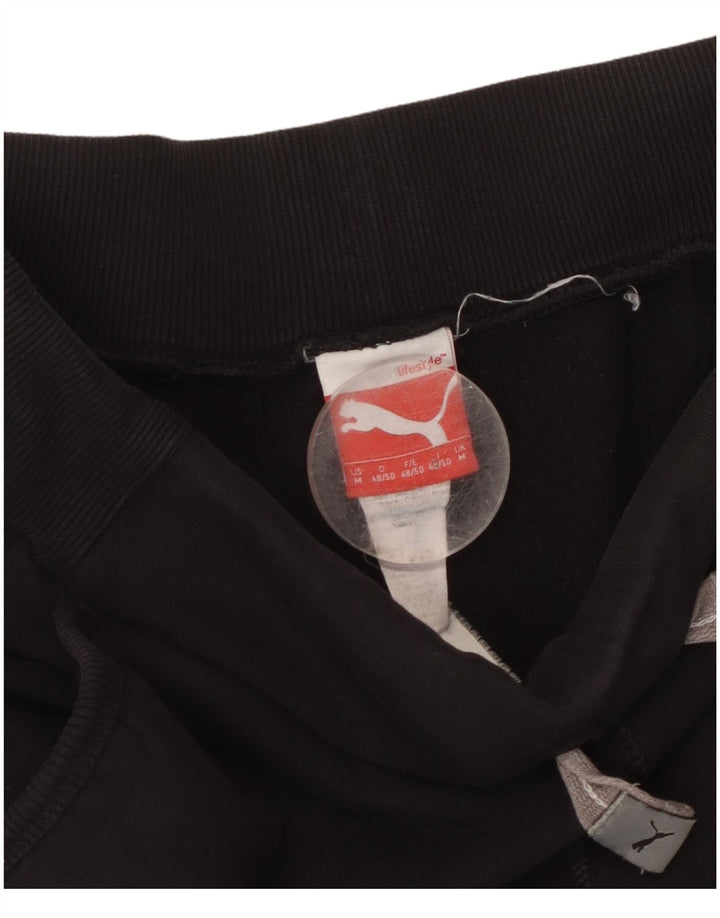 Puma Herren-Trainingshose mit Grafik, mittelschwarze Baumwolle