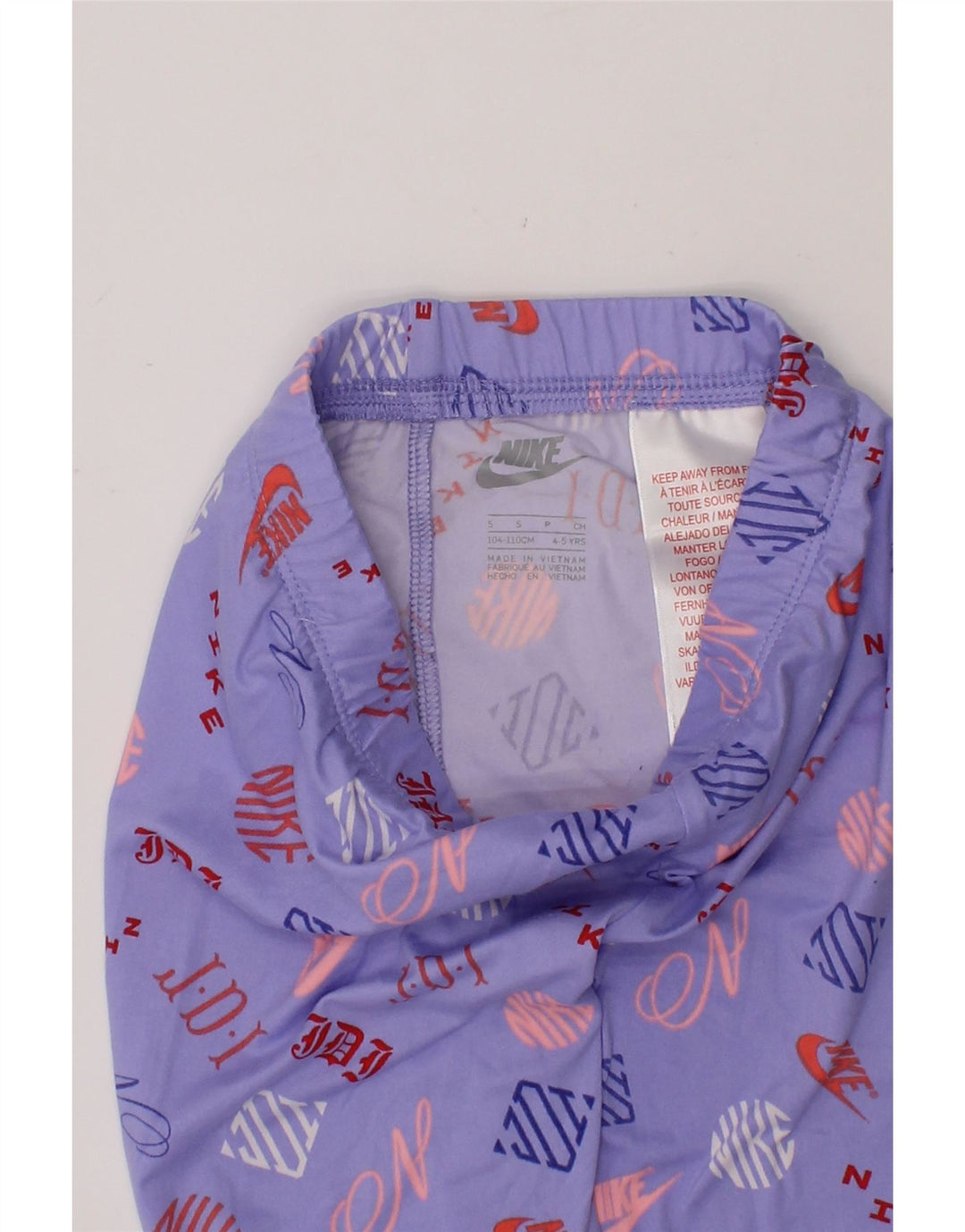 NIKE Girls Graphic Leggings 4-5 Years Small Purple Polyester Vintage Nike and Second-Hand Nike from Messina Hembry 