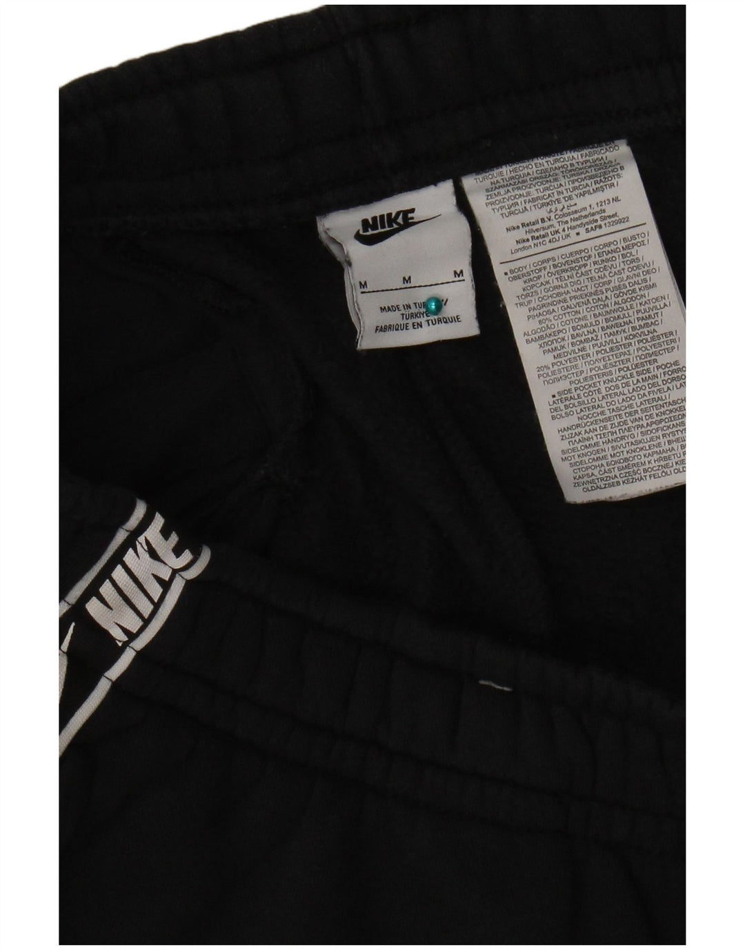 Nike Herren-Trainingshose mit Grafik, mittelschwarz, Baumwolle