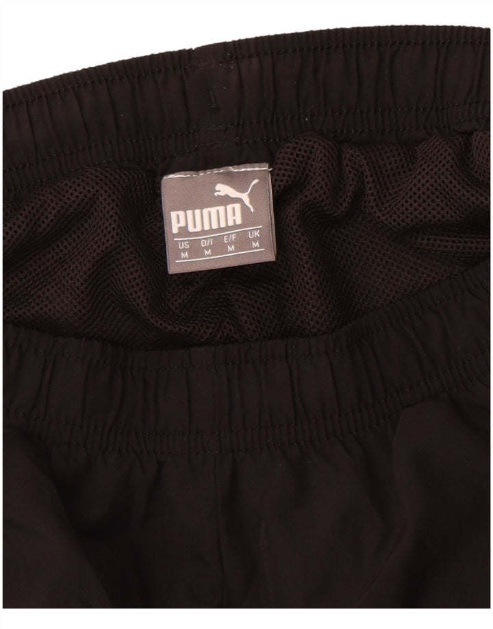 Puma Herren-Trainingshose mit Grafik, mittelschwarz, Polyester