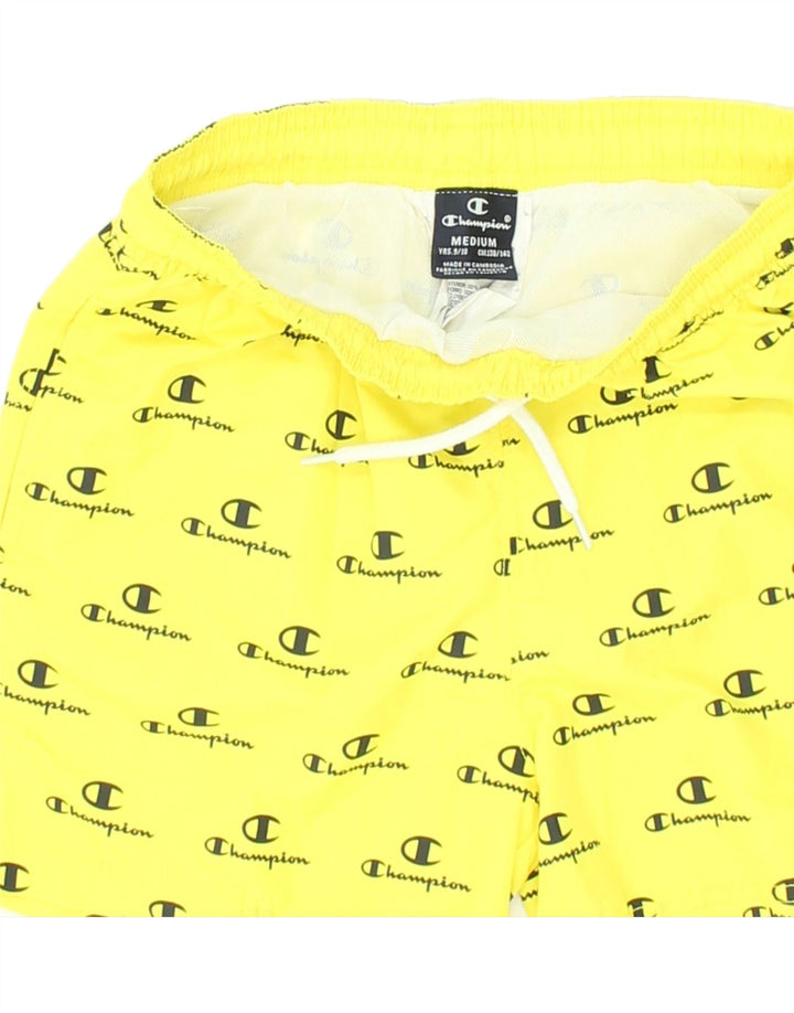 CHAMPION Boys Graphic Sport Shorts 9-10 Years Medium Yellow Polyester Vintage Champion and Second-Hand Champion from Messina Hembry 