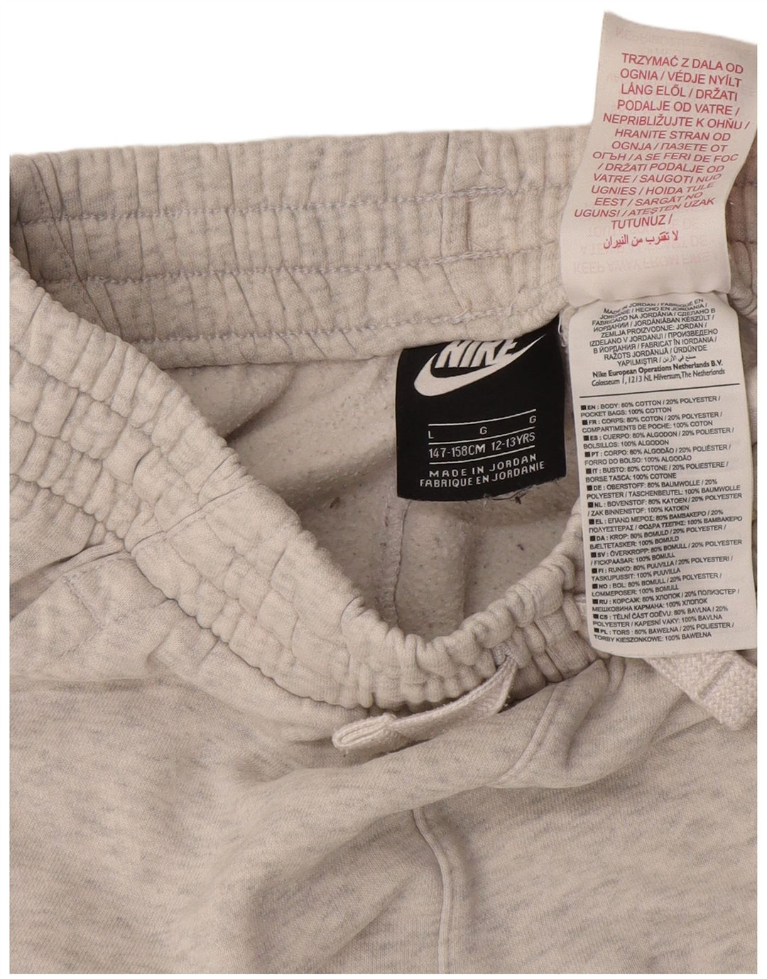 Nike Jungen-Trainingsanzug mit Grafik, Jogginghose, 12–13 Jahre, Größe L, Grau meliert
