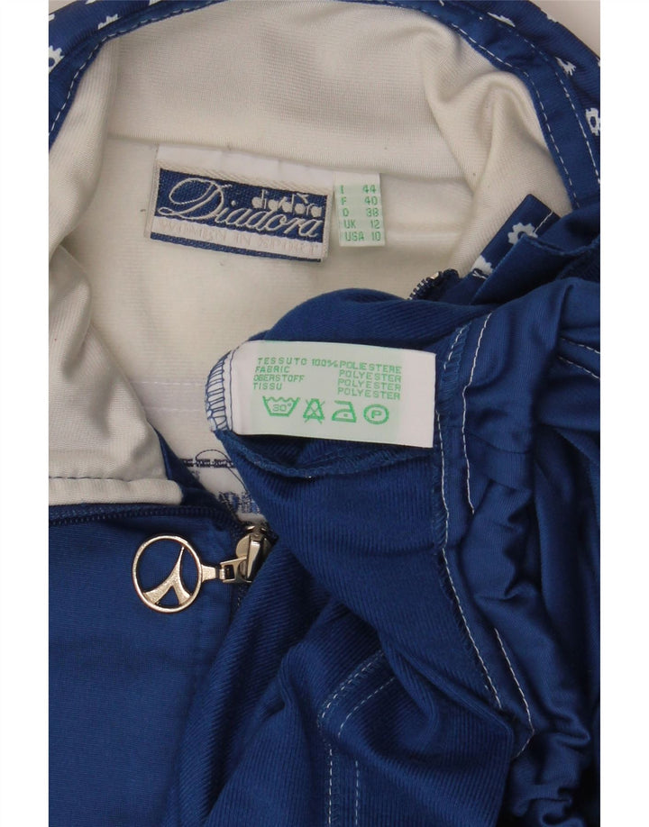 DIADORA Übergroße Trainingsjacke für Damen, UK 12, Mittelblau mit Blumenmuster