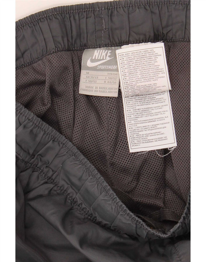 Nike Herren-Trainingshose aus mittelschwarzem Nylon