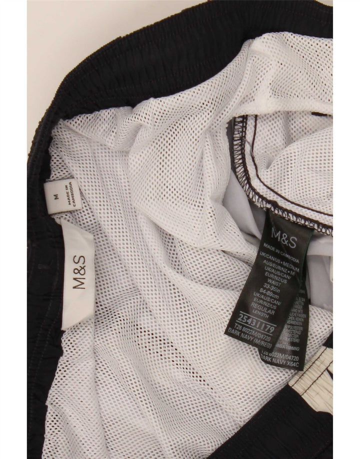 Marks & Spencer Herren-Badeshorts, Mittelschwarz, geblümt, Polyester