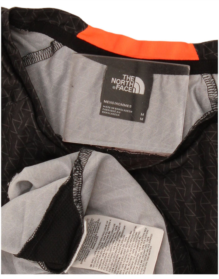 The North Face Herren T-Shirt-Oberteil Mittelschwarzes geometrisches Polyester