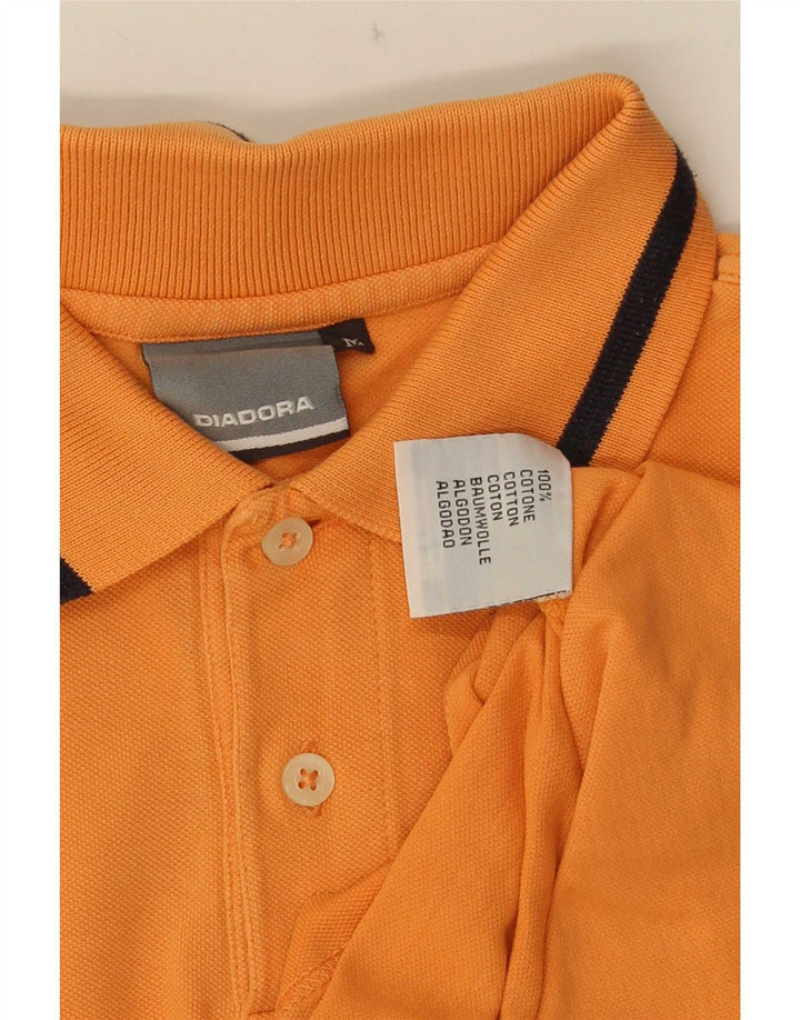 Diadora Herren-Poloshirt aus mitteloranger Baumwolle