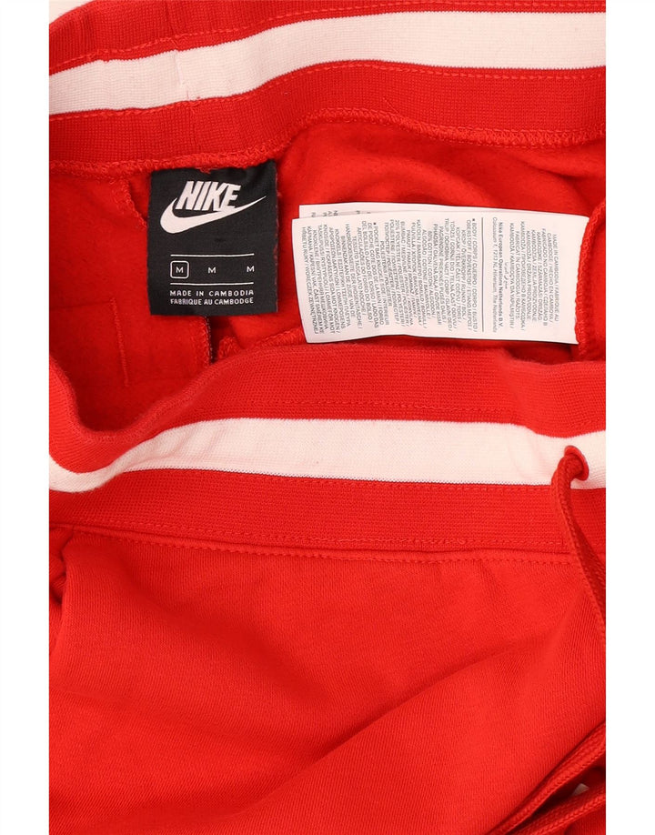 Nike Herren-Trainingshose mit grafischem Muster, mittelrote Farbblock-Baumwolle