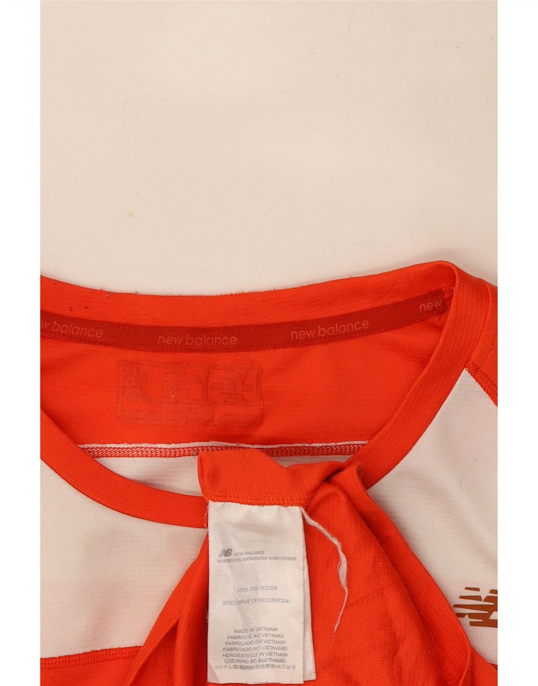 New Balance Herren-T-Shirt-Oberteil aus mittelorangefarbenem Colourblock-Polyester