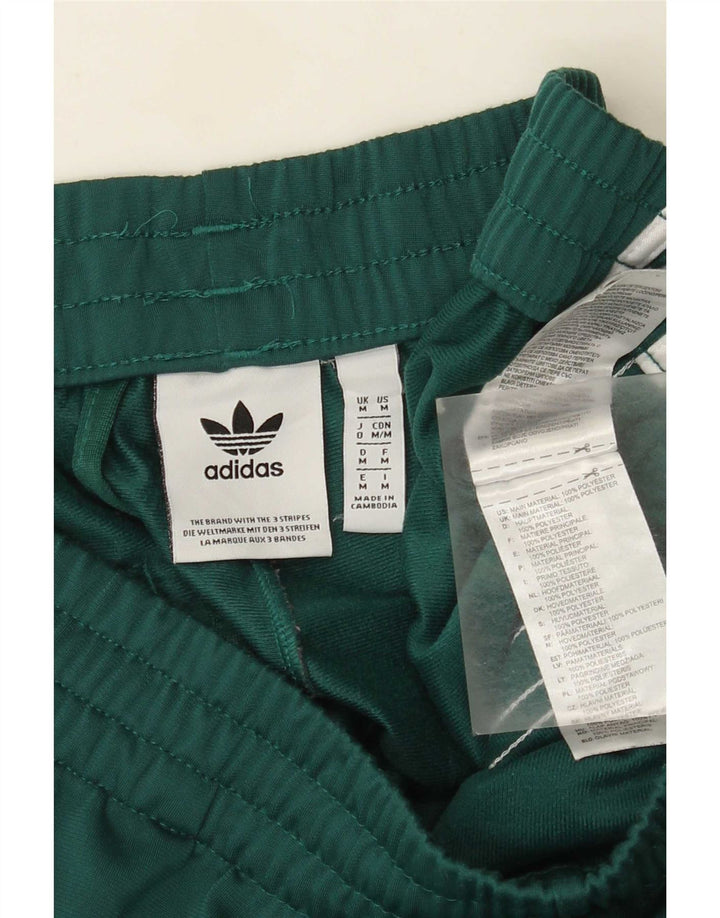 Adidas Herren-Trainingshose aus mittelgrünem Polyester