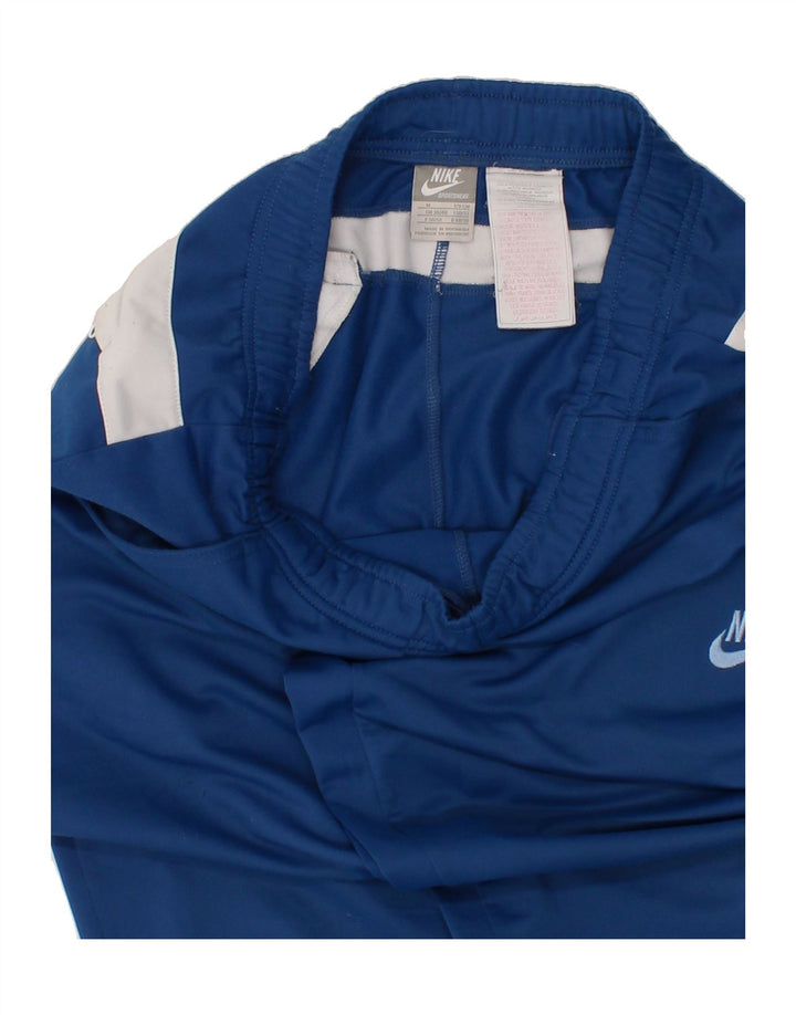 NIKE Mens Tracksuit Trousers UK 38/40 Medium  Blue Colourblock Polyester Vintage Nike and Second-Hand Nike from Messina Hembry 