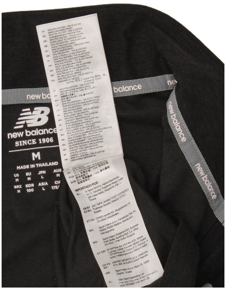 New Balance Herren-Pullover-Trainingsanzugoberteil mit Reißverschluss und Halsausschnitt, Mittelschwarz gefleckt