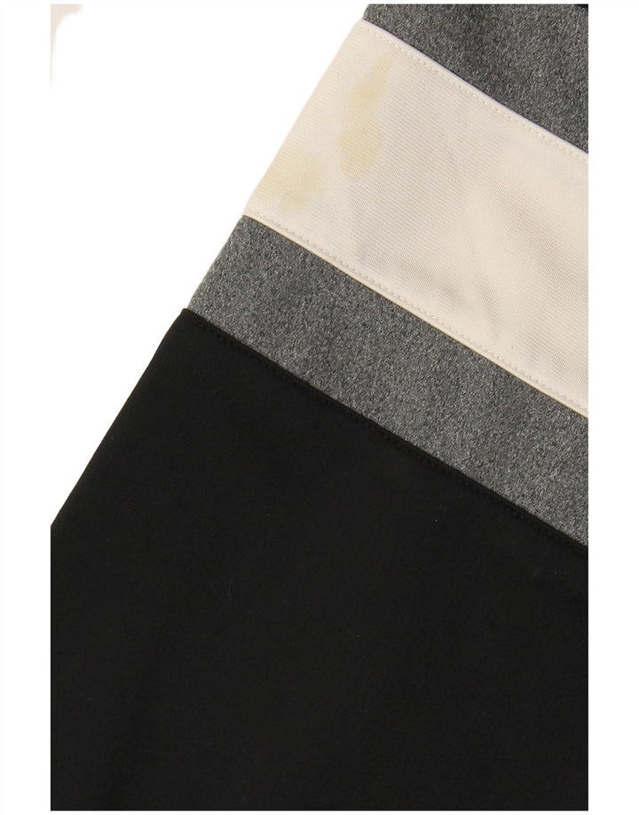 REEBOK Herren-Trainingsanzug mit lockerer Passform und grafischem Oberteil, Größe S, Schwarz, Farbblock