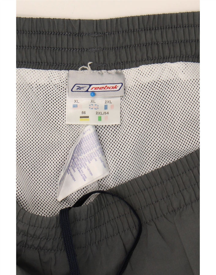 REEBOK Mens Tracksuit Trousers XL Grey Polyester Sports Vintage Reebok and Second-Hand Reebok from Messina Hembry 