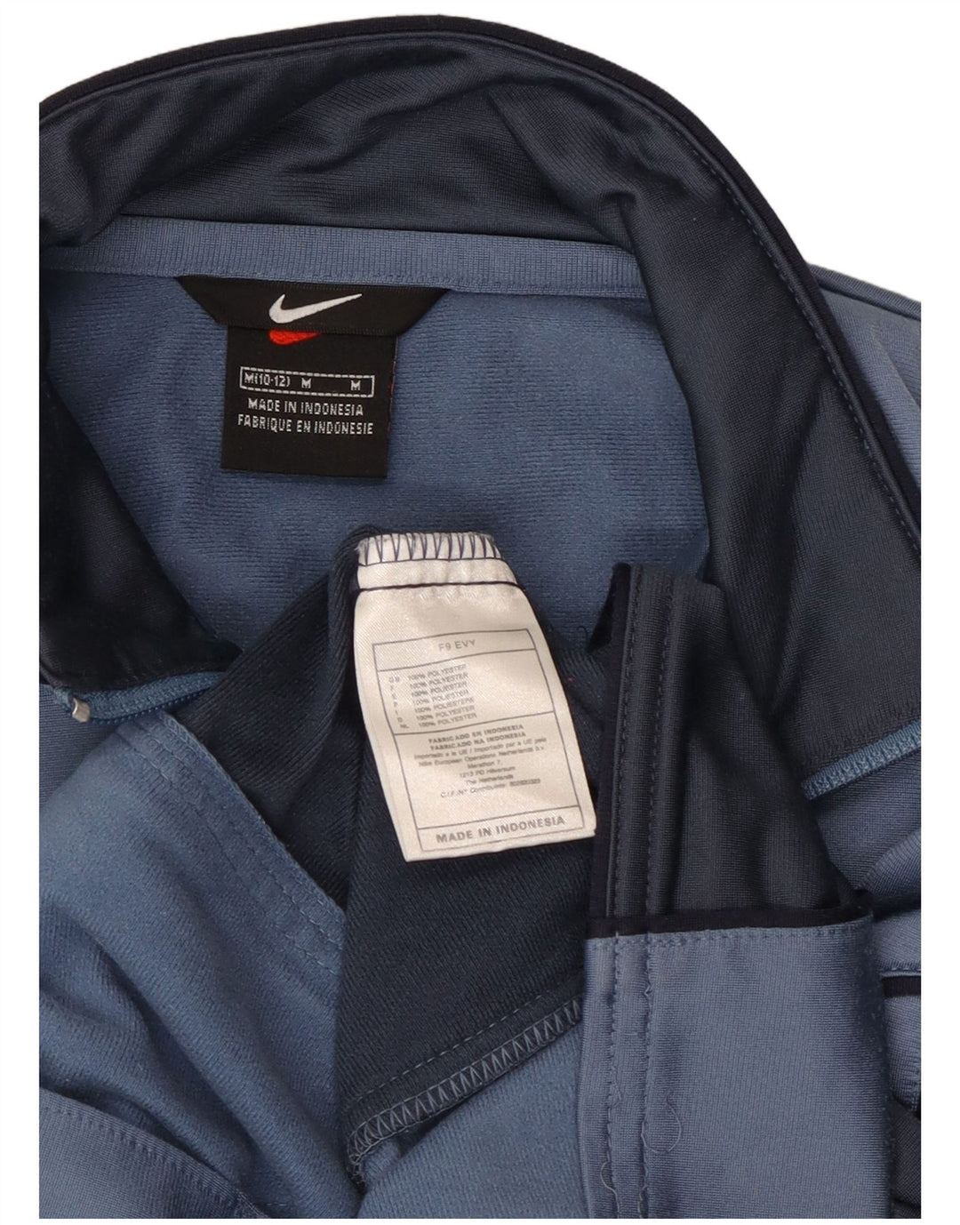 Nike Jungen-Trainingsanzugoberteil mit Grafik, 10–11 Jahre, Mittelblau, Farbblock