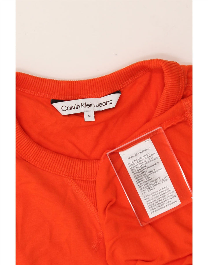 CALVIN KLEIN JEANS Mens Graphic T-Shirt Top Medium Orange Cotton Vintage Calvin Klein Jeans and Second-Hand Calvin Klein Jeans from Messina Hembry 