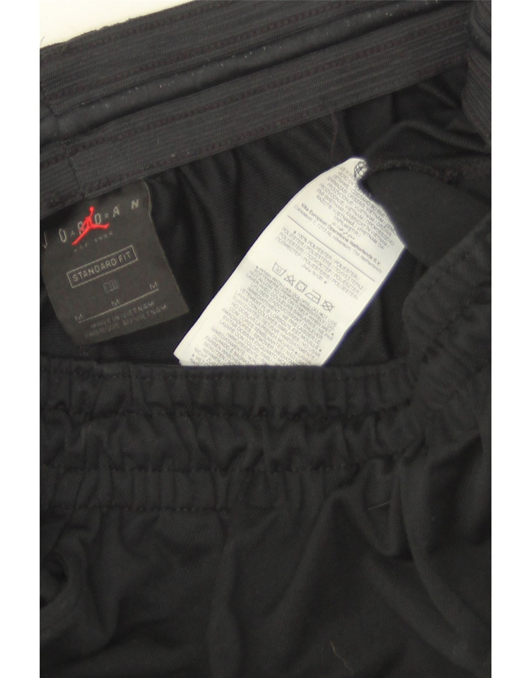 Jordan Herren-Trainingshose mit Standard-Passform, Mittelschwarz, Farbblock