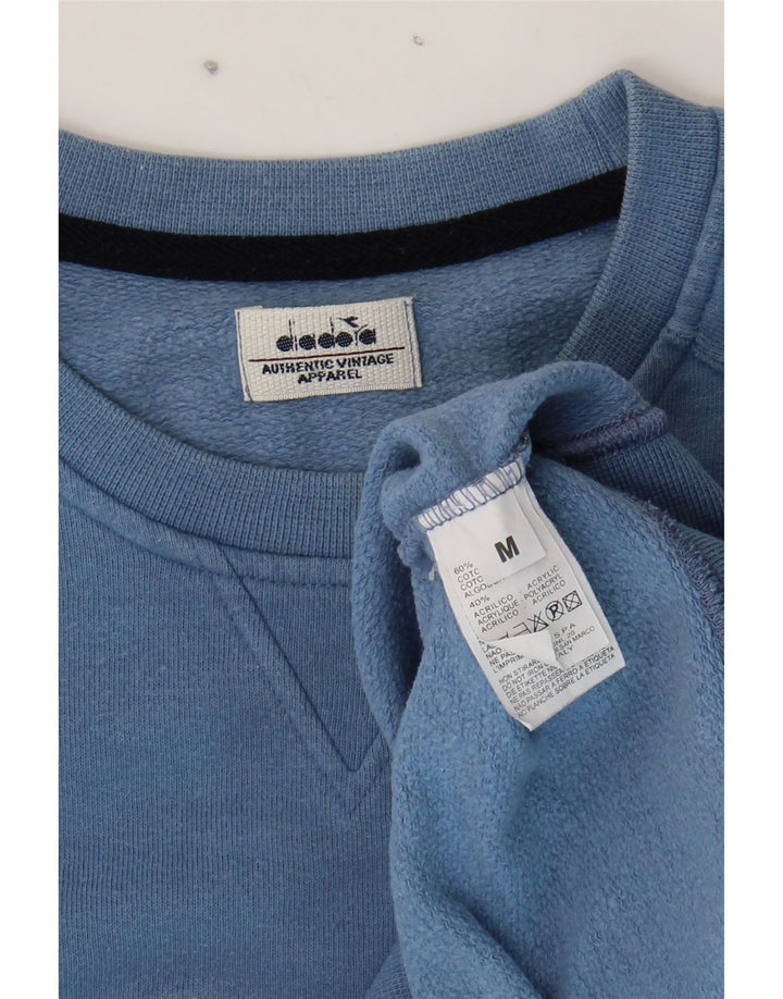 DIADORA Mens Graphic Sweatshirt Jumper Medium Blue Cotton Vintage Diadora and Second-Hand Diadora from Messina Hembry 