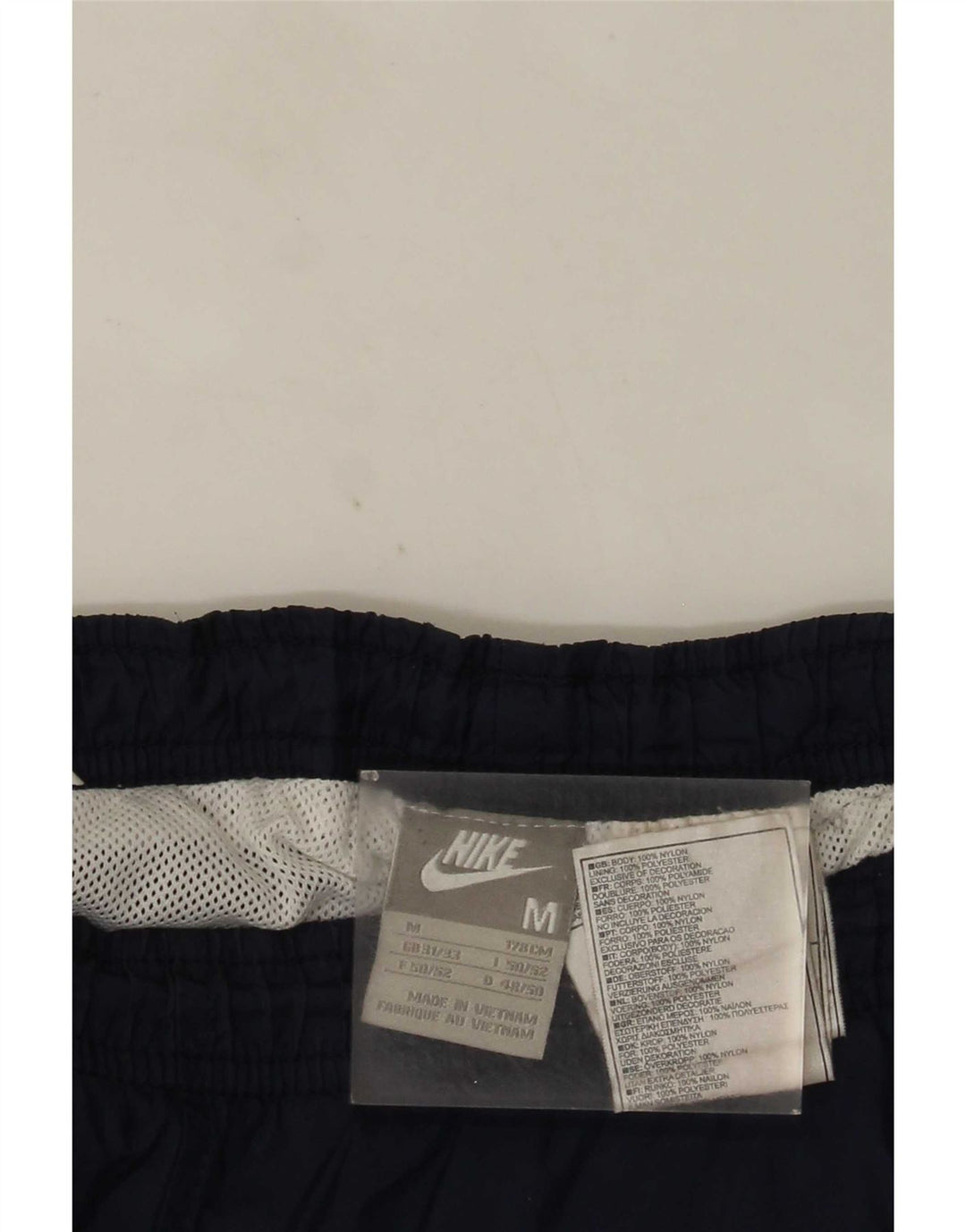 Nike Herren-Trainingshose aus Nylon in mittlerem Marineblau