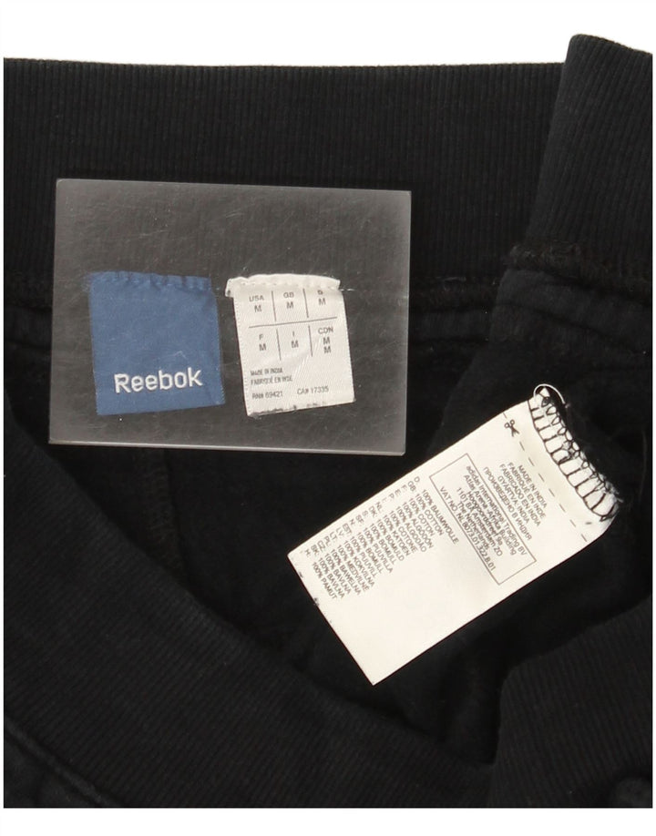 Reebok Herren-Trainingshose mit Grafik, mittelschwarz, Baumwolle