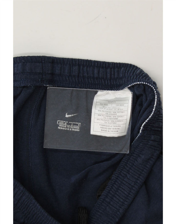 NIKE Womens Tracksuit Trousers UK 12/14 Large  Navy Blue Polyester Vintage Nike and Second-Hand Nike from Messina Hembry 