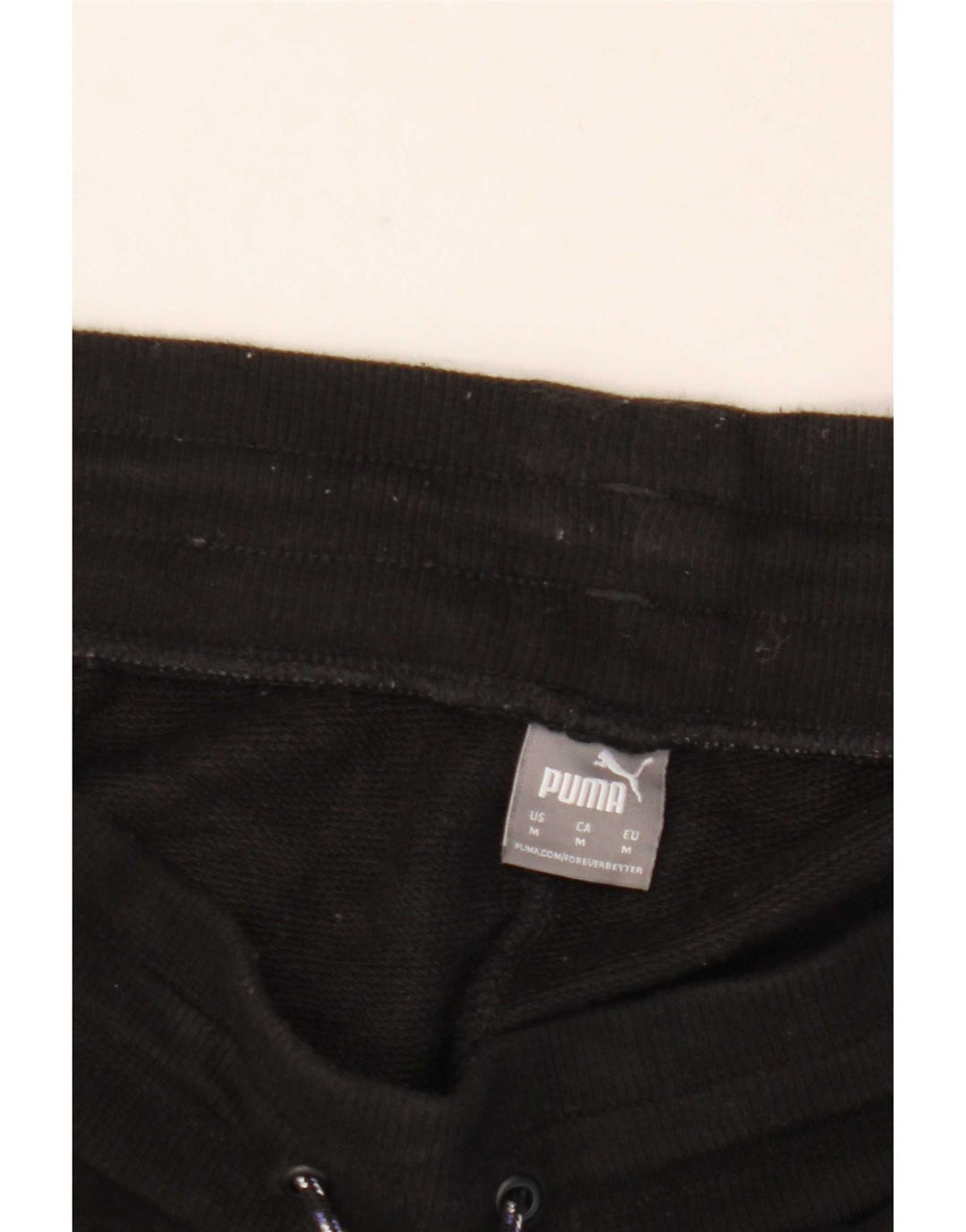 Puma Herren-Trainingshose, Jogginghose, Mittelschwarz, Tiermuster