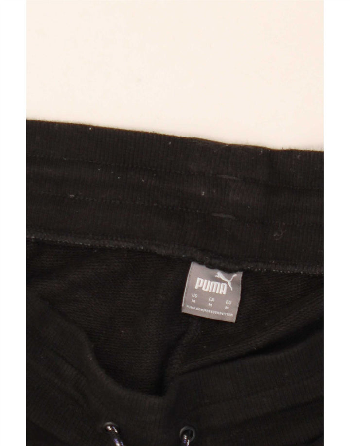 Puma Herren-Trainingshose, Jogginghose, Mittelschwarz, Tiermuster