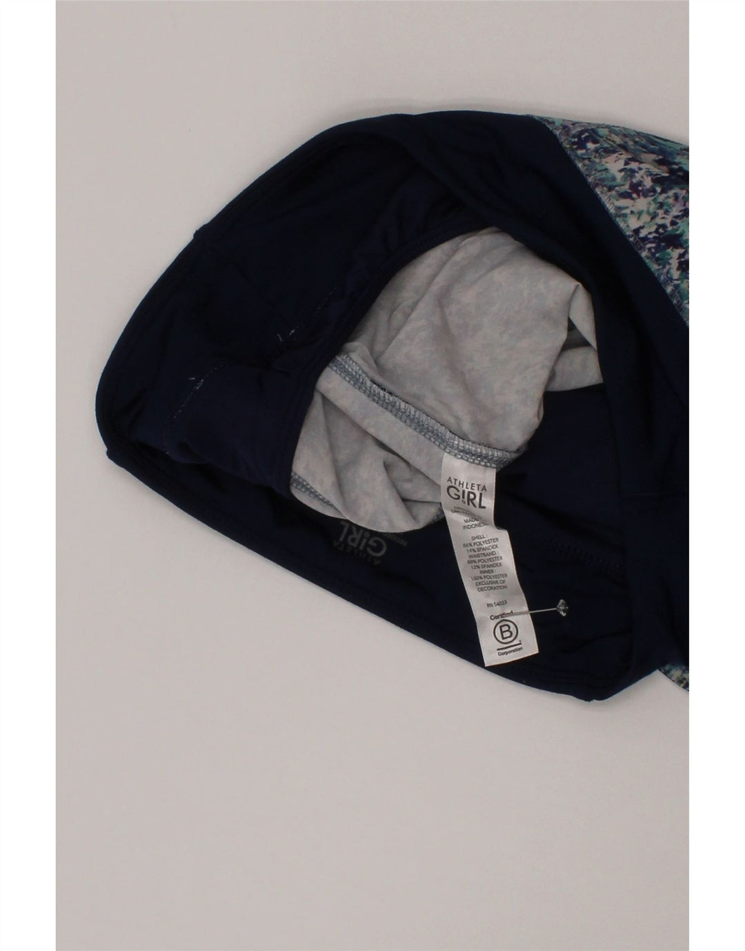 Athleta Mädchen-Sportshorts mit abstraktem Muster, 11–12 Jahre, Größe L, Marineblau