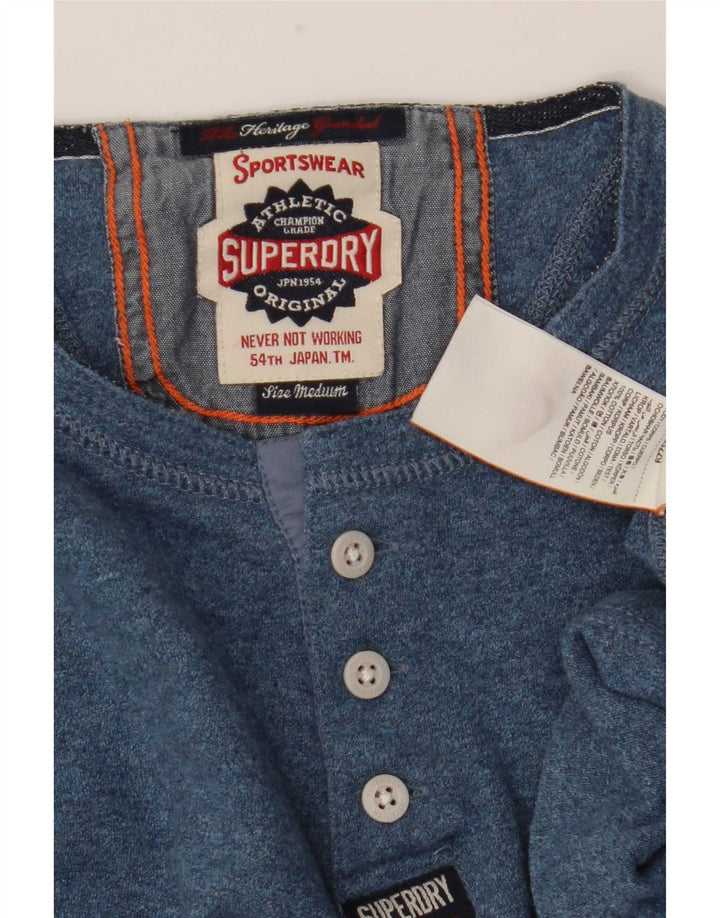 Superdry Herren-Langarmoberteil aus mittelblauer Baumwolle