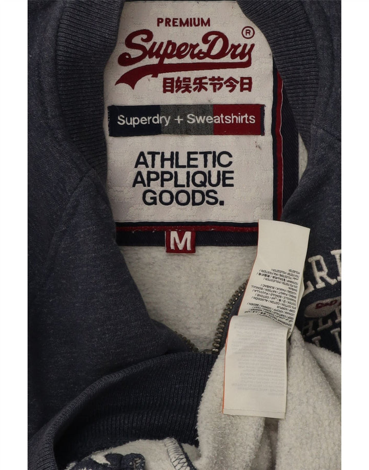 Superdry Herren-Trainingsanzugoberteil mit grafischem Muster, mittelblaue, gesprenkelte Baumwolle