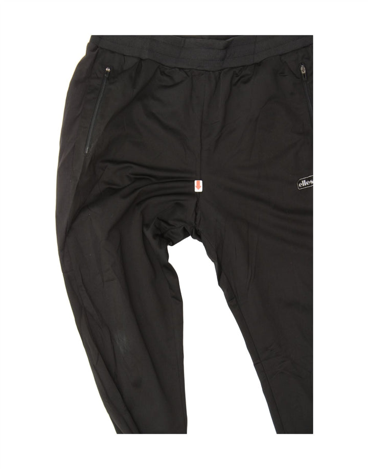 ELLESSE Mens Tracksuit Trousers Joggers Medium Black Polyester Vintage Ellesse and Second-Hand Ellesse from Messina Hembry 