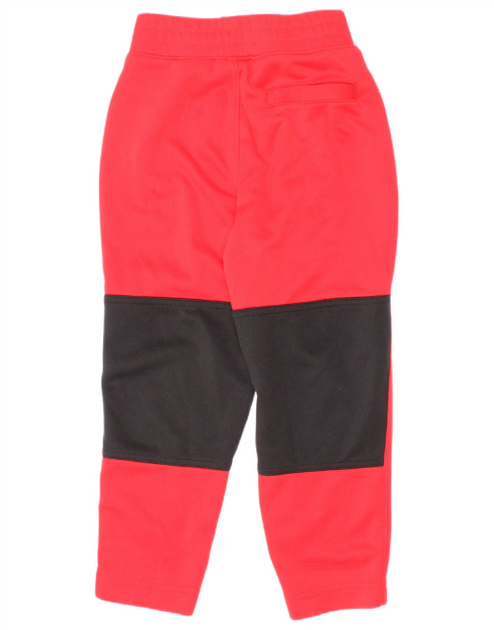 Nike Jungen-Trainingshose mit Grafik, 3–4 Jahre, rotes Farbblockdesign