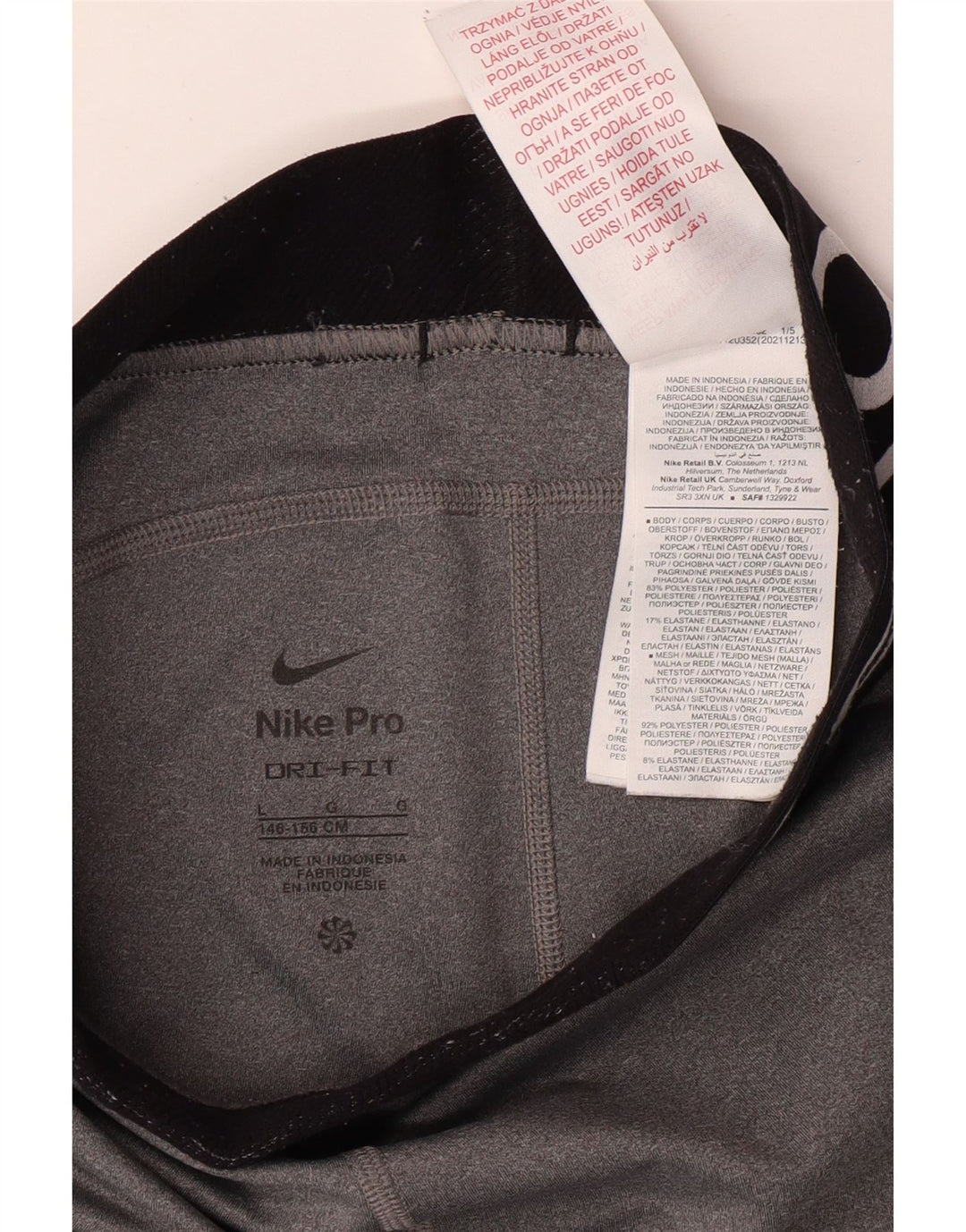 NIKE Leggings mit Dri-Fit-Grafik für Mädchen, 12–13 Jahre, Größe L, Grau, Farbblock