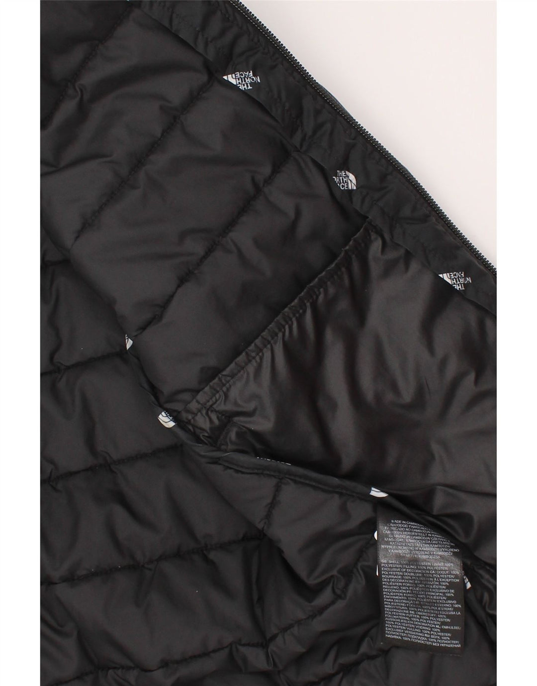 The North Face Wattierte Jacke mit grafischer Kapuze für Jungen, 9–10 Jahre, Mittelschwarz
