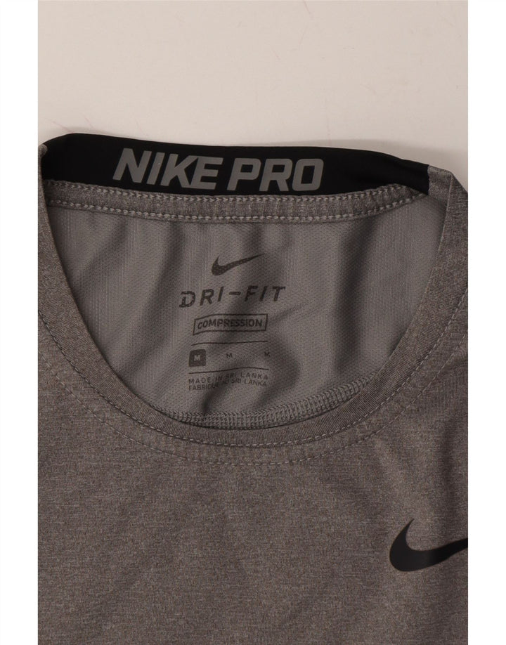 NIKE Womens Dri Fit Graphic T-Shirt Top UK 12 Medium Grey Vintage Nike and Second-Hand Nike from Messina Hembry 